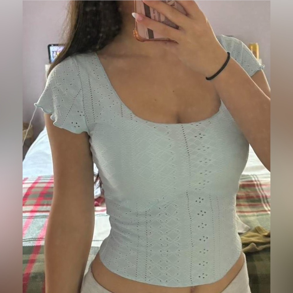 baby blue top with ruffle sleeves